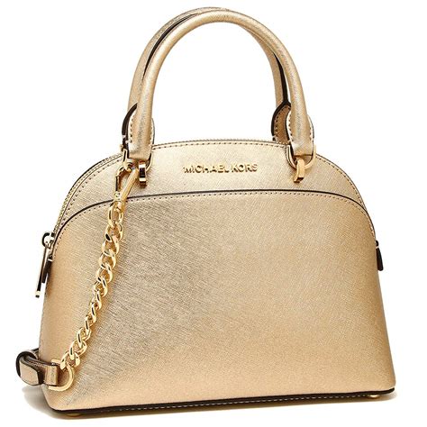 gold michael kors bag|michael kors gold leather handbags.